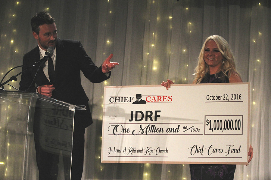 Eric Church presenting a Chief Cares Fund gift to JDRF