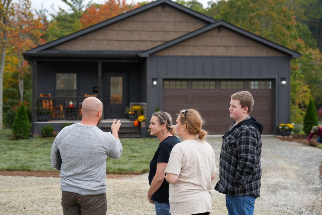 A family touring their new home